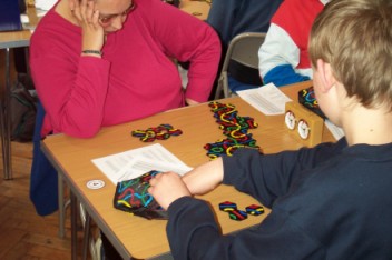 Round 3 - Tracey Fletcher (green, left) v William Brooks (red) - a different kind of 'long' game